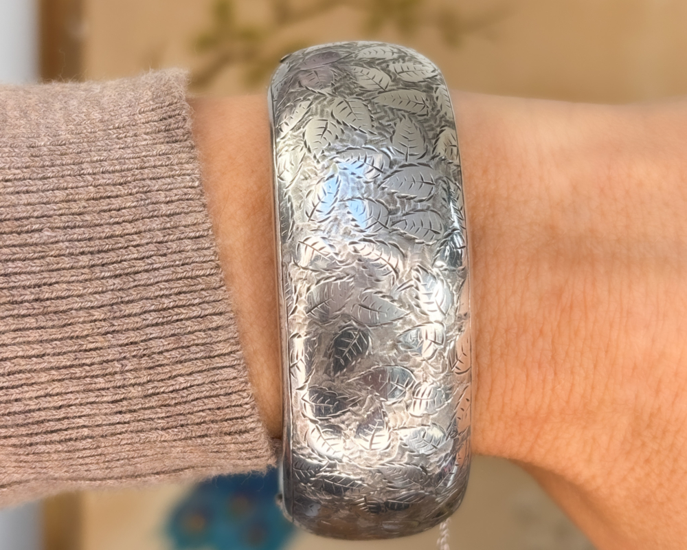 antique Victorian silver bangle with floral pattern engraved. for sale in Leeds, UK