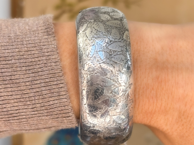antique Victorian silver bangle with floral pattern engraved. for sale in Leeds, UK