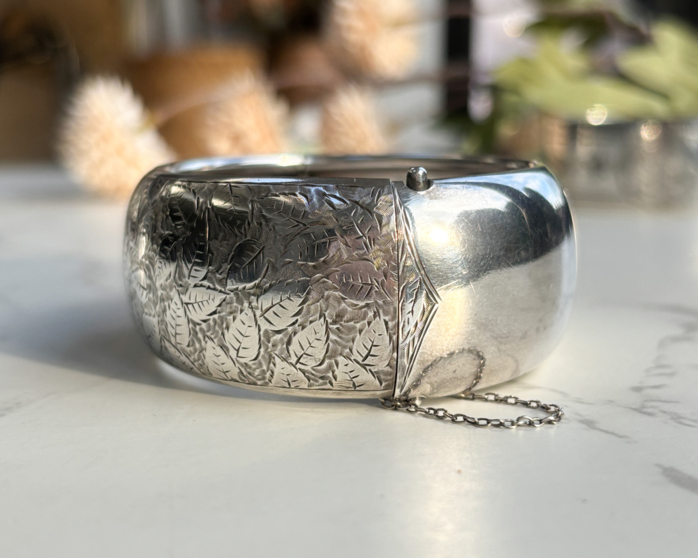 antique Victorian silver bangle with floral pattern engraved. for sale in Leeds, UK, showing hinge opening
