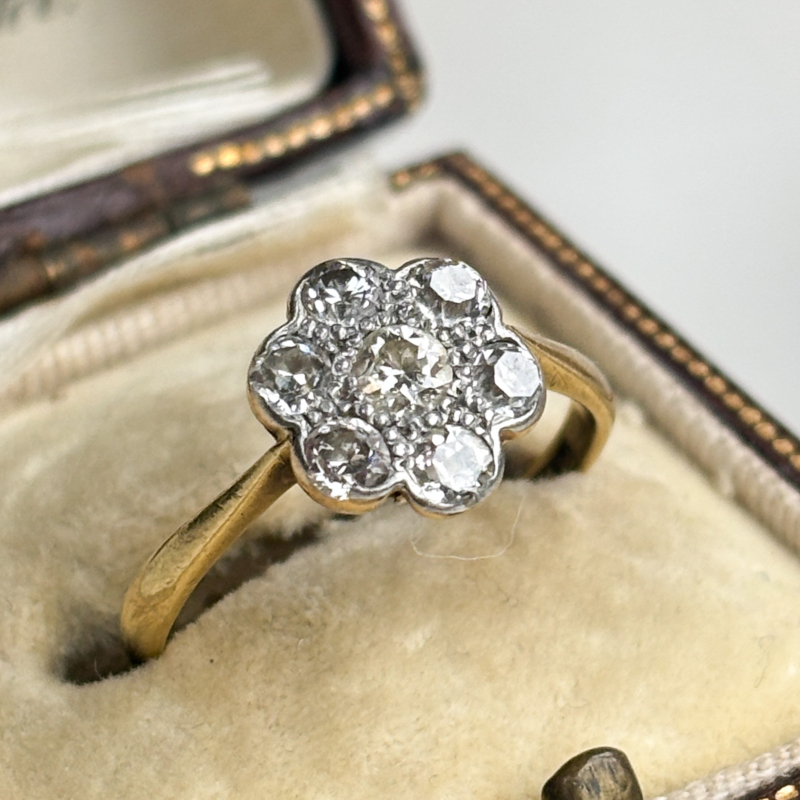 antique Art Deco diamond cluster ring in 18ct yellow gold and platinum for sale in Leeds, UK