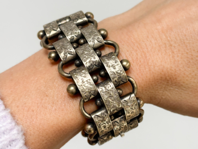 Victorian silver gilt bracelet on woman's wrist for sale in Leeds