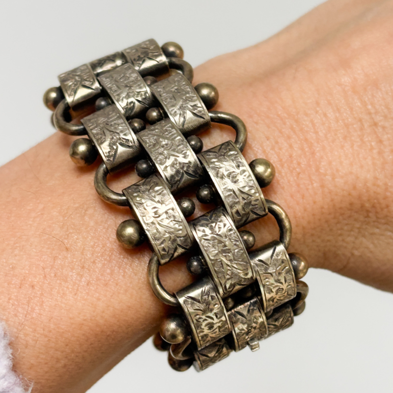 Victorian silver gilt bracelet on woman's wrist for sale in Leeds