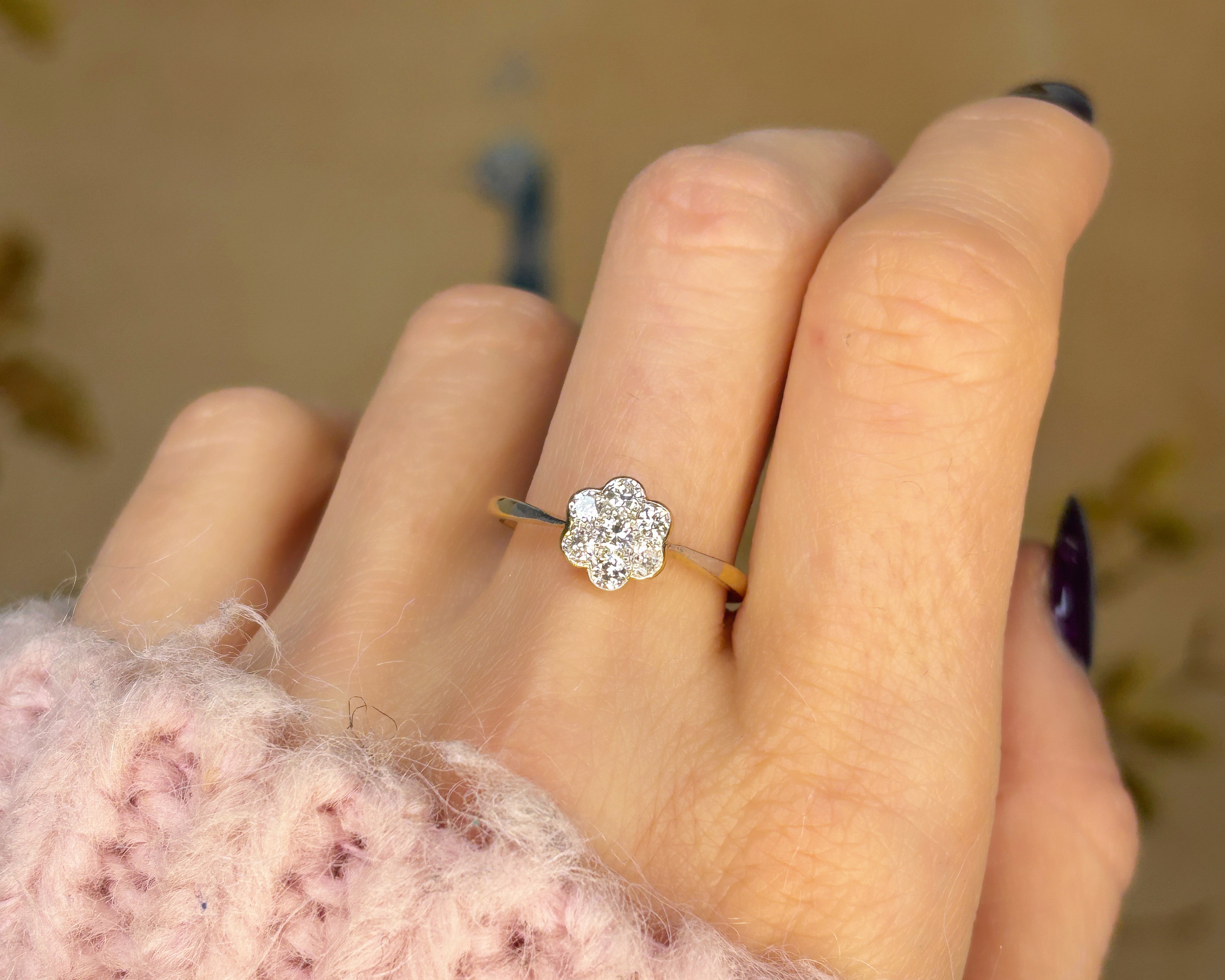 art deco daisy ring on hand