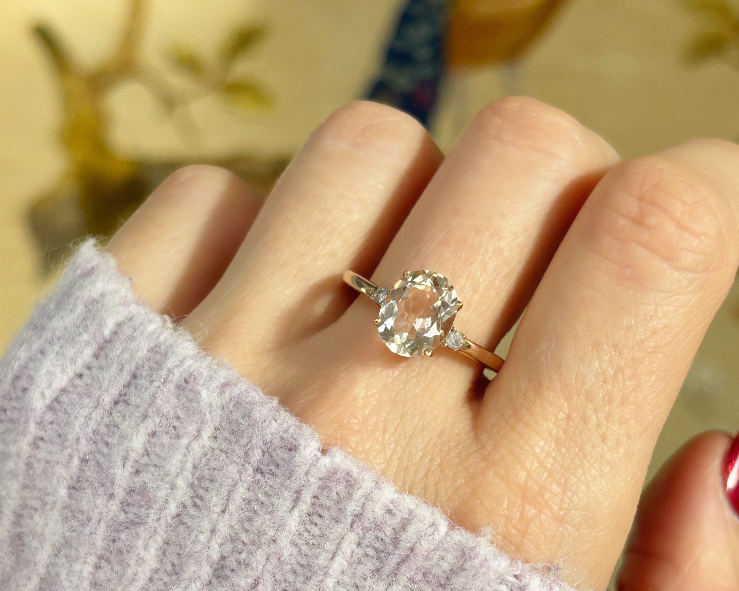 morganite ring on finger