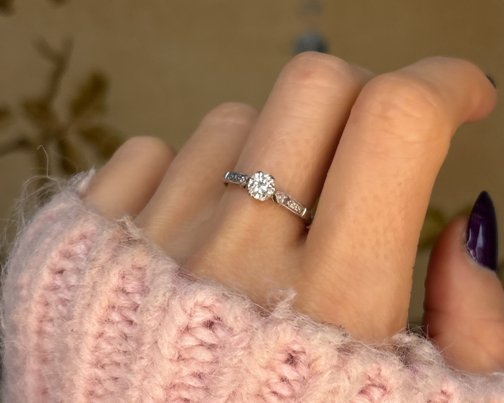 antique Art Deco platinum diamond solitaire ring 0.3ct for sale in Leeds, shown on a woman's hand