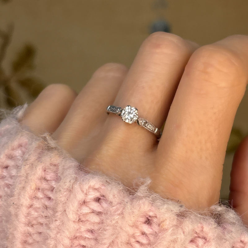 antique Art Deco platinum diamond solitaire ring 0.3ct for sale in Leeds, shown on a woman's hand