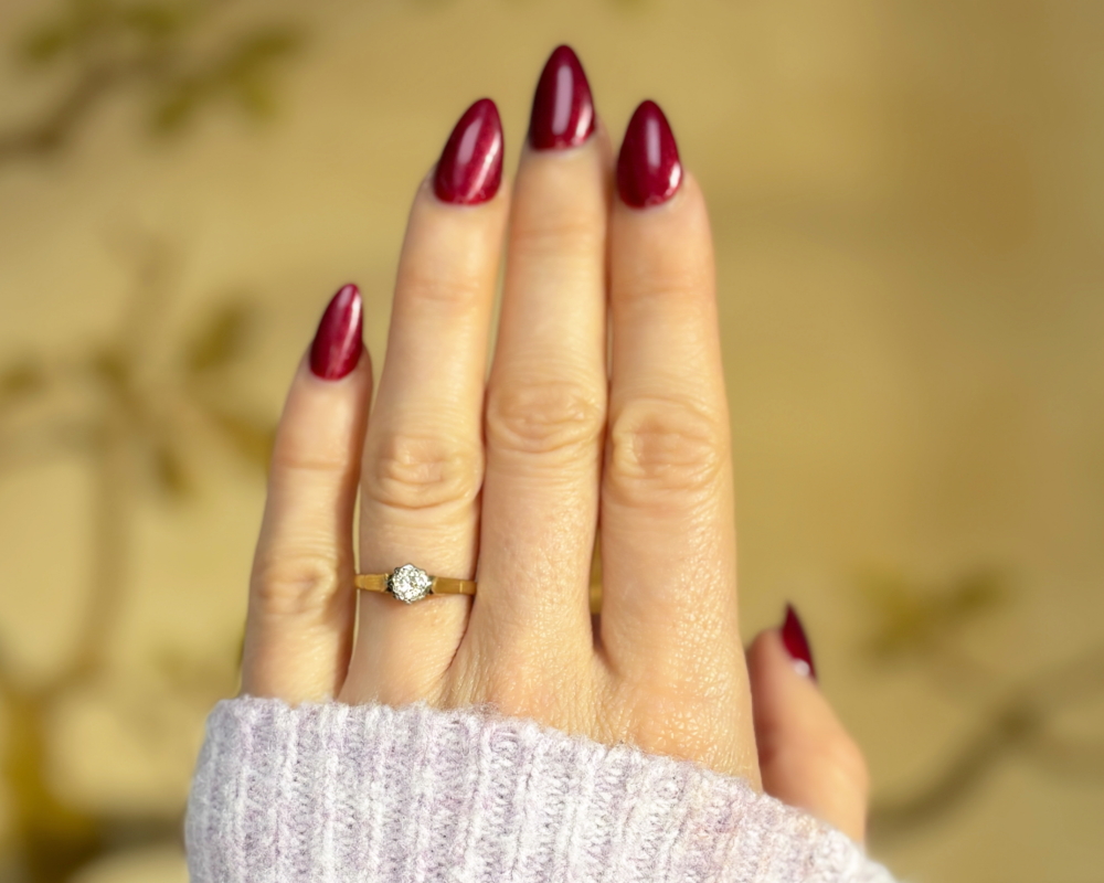 vintage diamond solitaire ring in 18ct gold for sale in Leeds, shown on a woman's hand