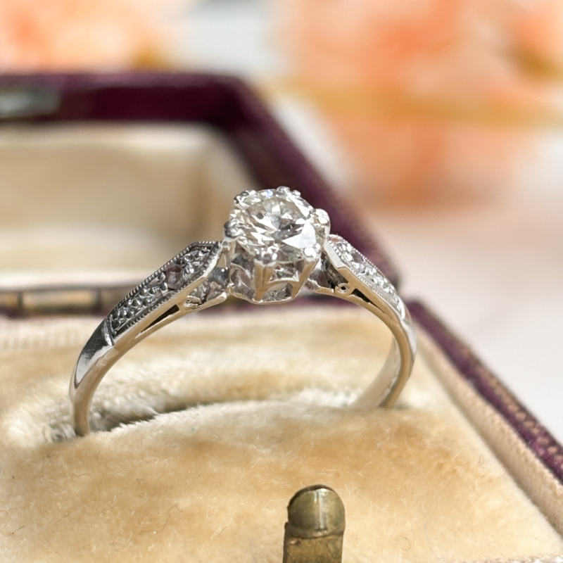 antique Art Deco platinum diamond solitaire ring 0.3ct for sale in Leeds, shown in an antique brown box