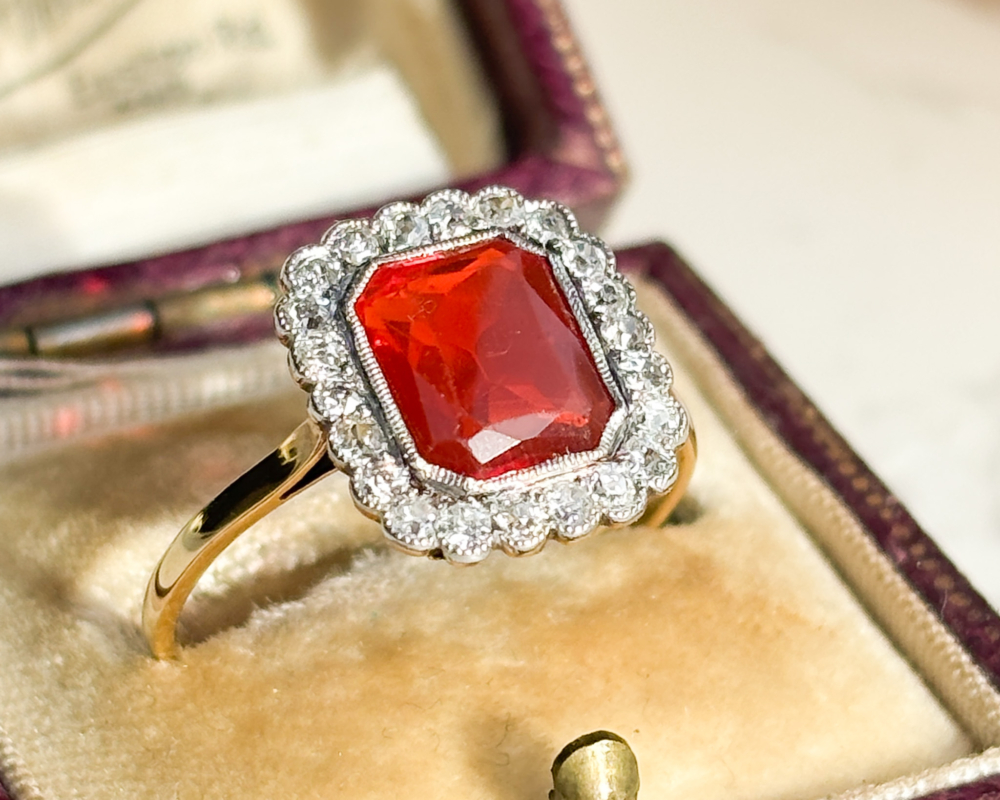 Art Deco fire opal and diamond ring in 18ct yellow gold for sale in Leeds, shown in antique brown box