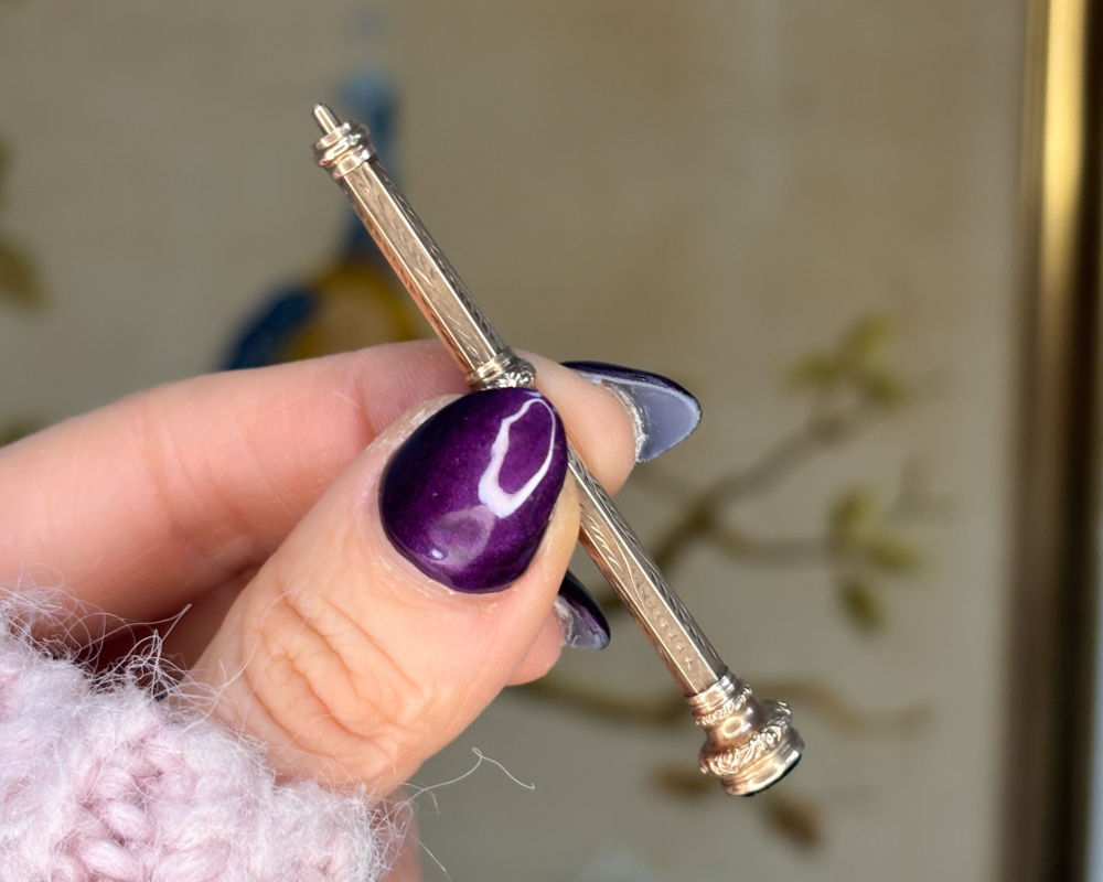 antique 9ct gold pencil held in woman's hand for sale