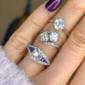antique engagement rings on a finger
