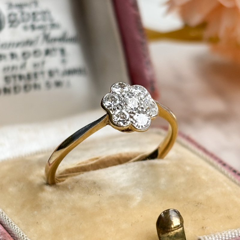 antique 1930s diamond daisy cluster ring for sale in Leeds, shown in an antique pink box