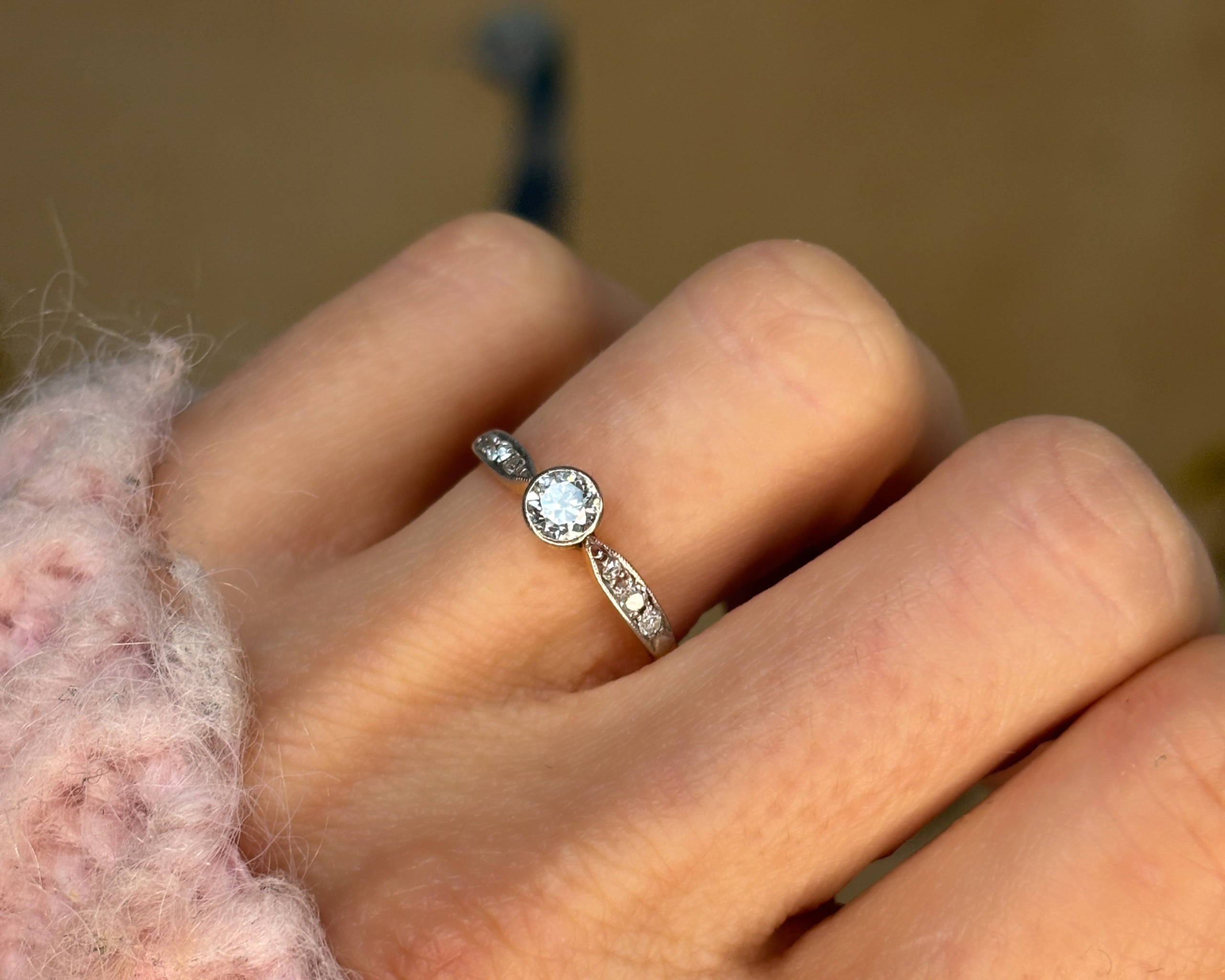 bezel set diamond solitaire ring