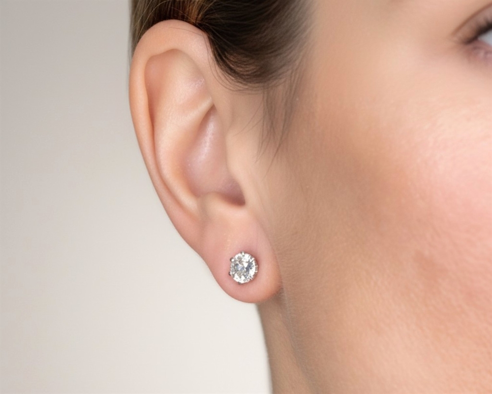 antique 2ct old cut diamond studs for sale in Leeds in model's ear