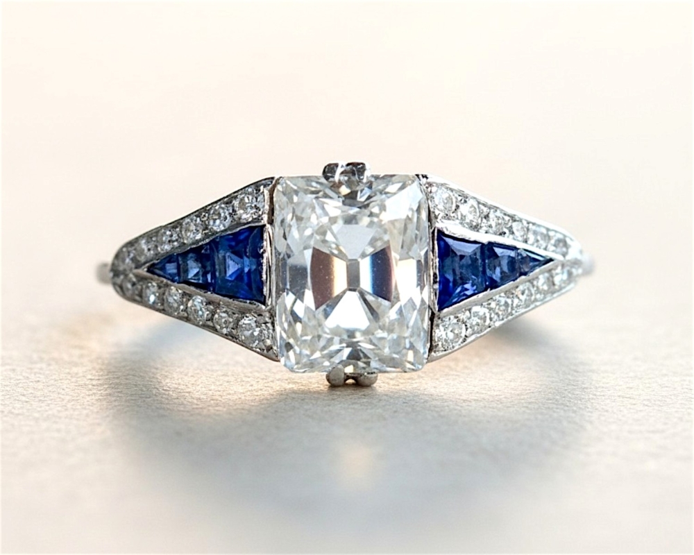 antique Art Deco old mine cut diamond set in platinum with sapphire shoulders. 2.4ct centre stone, for sale in Leeds, UK