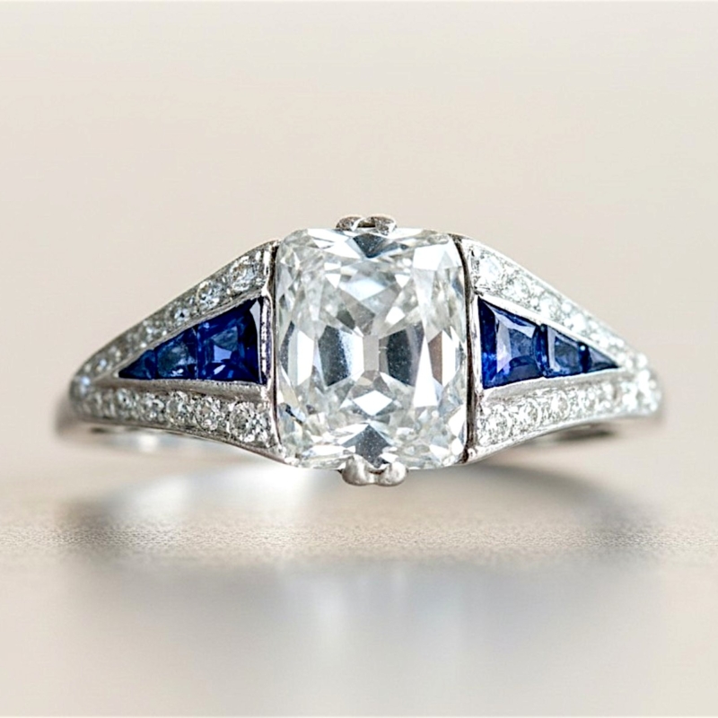antique Art Deco old mine cut diamond set in platinum with sapphire shoulders. 2.4ct centre stone, for sale in Leeds, UK
