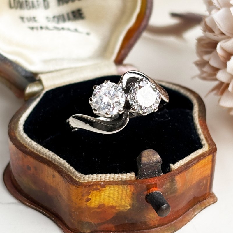 antique 1930s toi et moi diamond ring in 18ct white gold, approx 1.5ct diamond weight. For sale in Leeds, shown in an antique brown box
