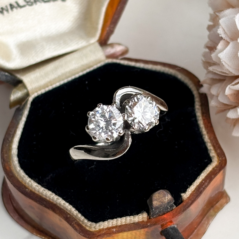 antique 1930s toi et moi diamond ring in 18ct white gold, approx 1.5ct diamond weight. For sale in Leeds, shown in an antique brown box