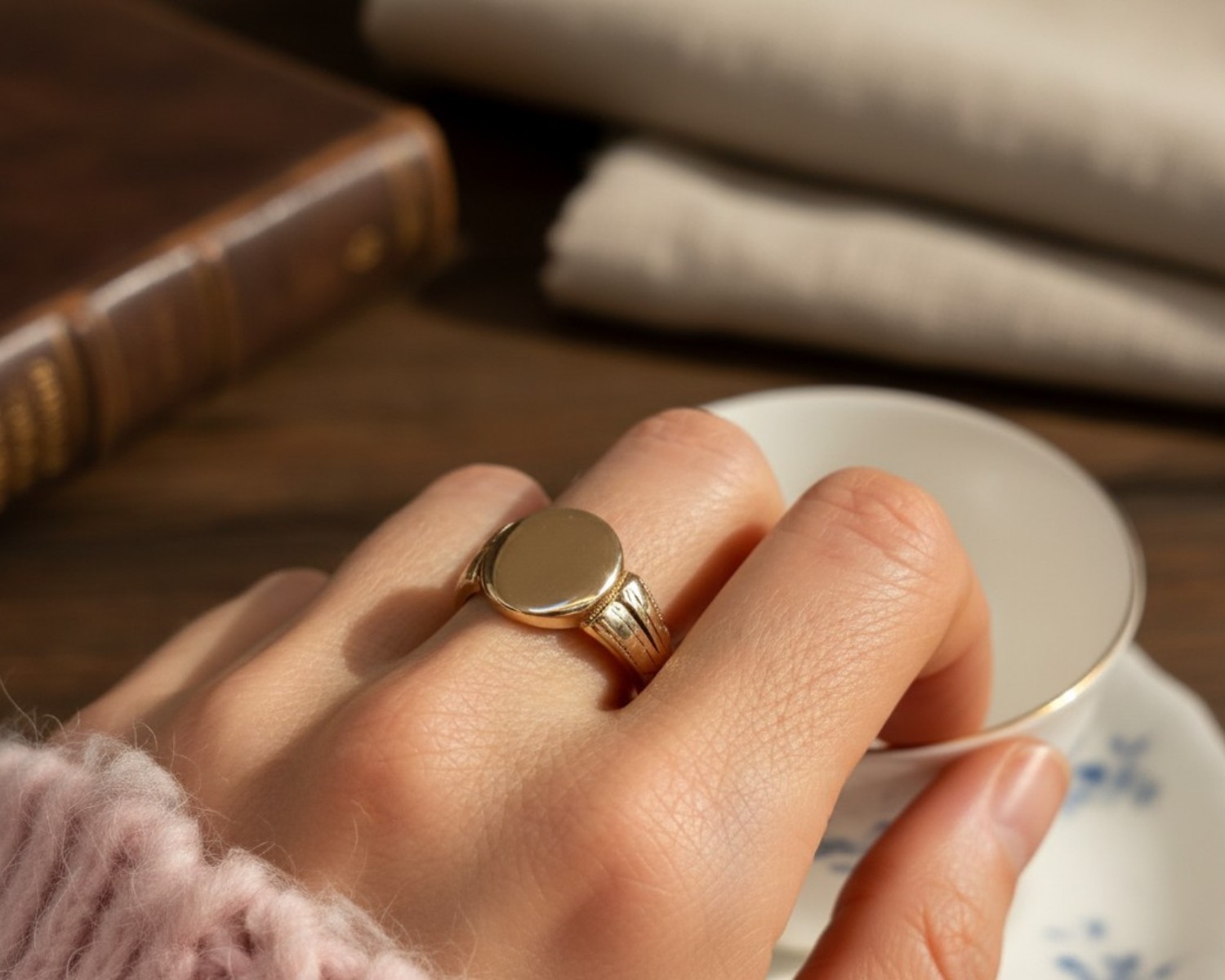 9ct gold signet ring on hand