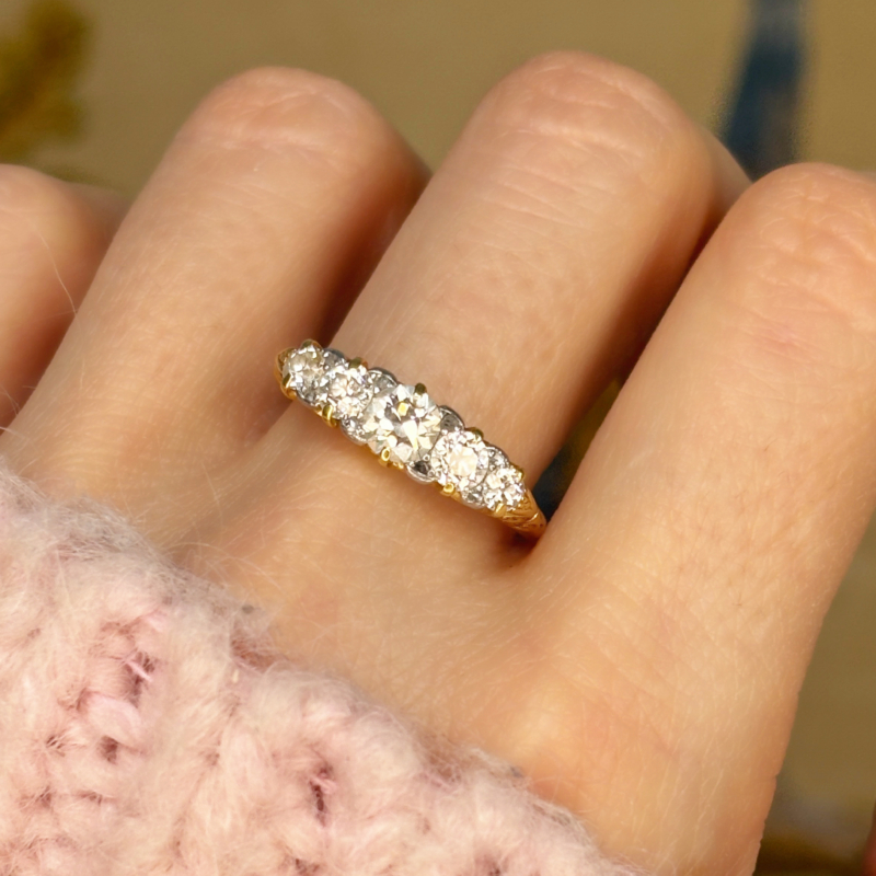 antique Edwardian five stone diamond ring in 18ct yellow gold, approx 1ct. For sale in Leeds, UK, shown on woman's hand