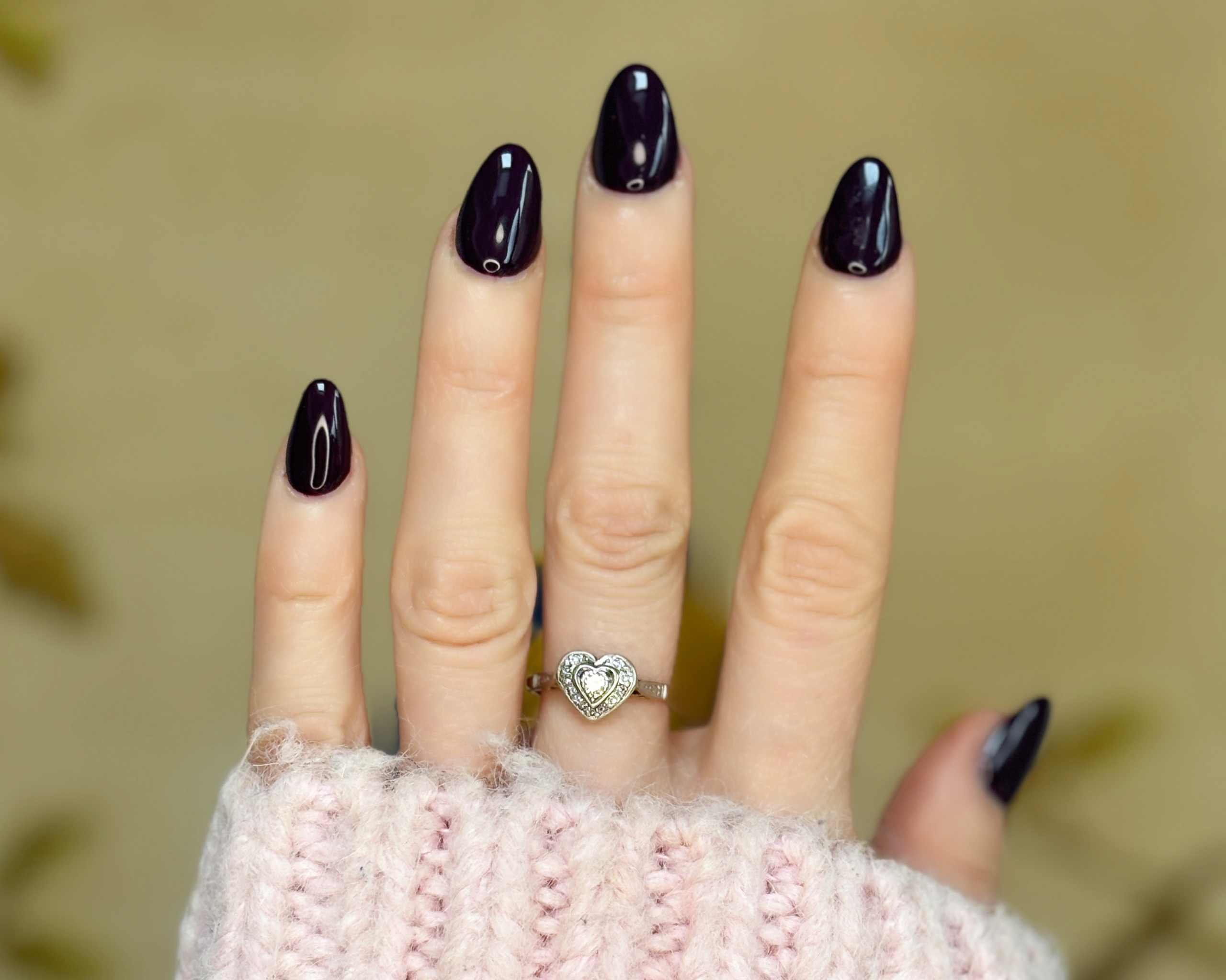 diamond heart ring on hand