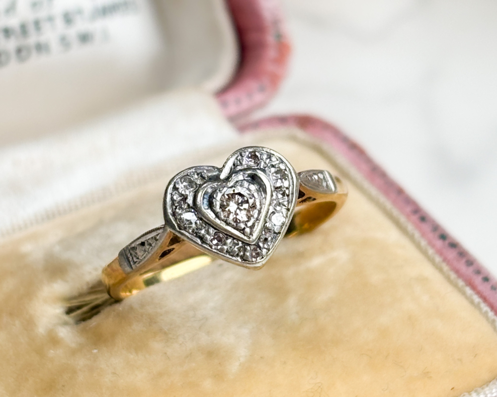 1940S diamond heart ring in 18ct yellow gold and platinum for sale in Leeds, shown in an antique pink box