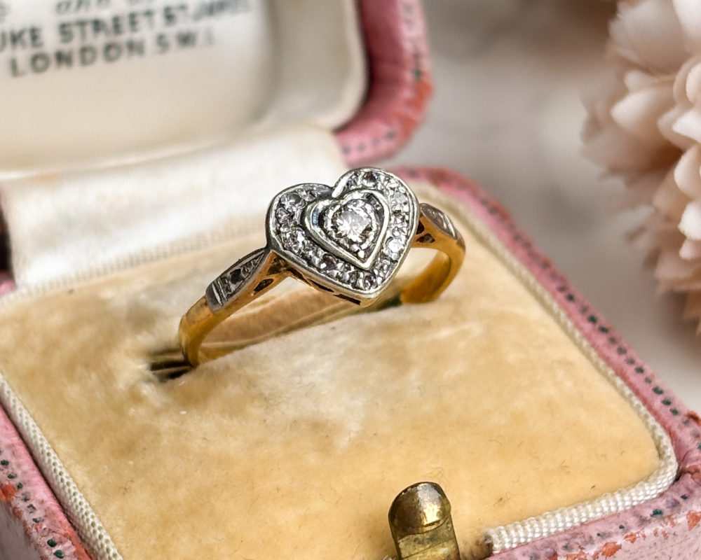 1940S diamond heart ring in 18ct yellow gold and platinum for sale in Leeds, shown in an antique pink box