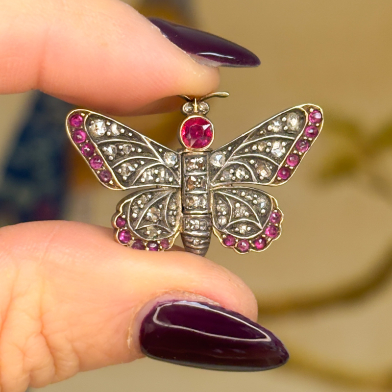 antique Victorian ruby and rose cut diamond butterfly brooch in silver and 14ct gold. For sale in Leeds