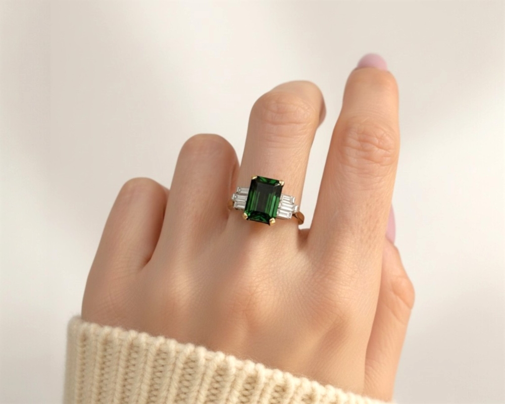antique Art Deco green tourmaline and baguette diamond ring in 18ct yellow gold and platinum for sale in Leeds, on model's hand