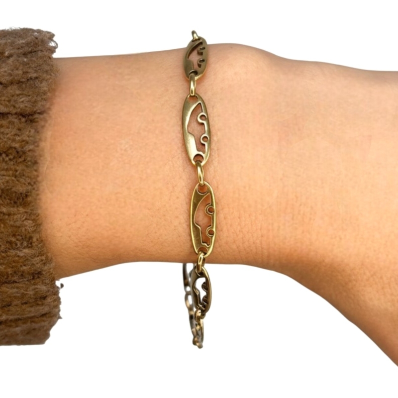 vintage 18ct gold bracelet with fancy links for sale in Leeds. shown on a wrist