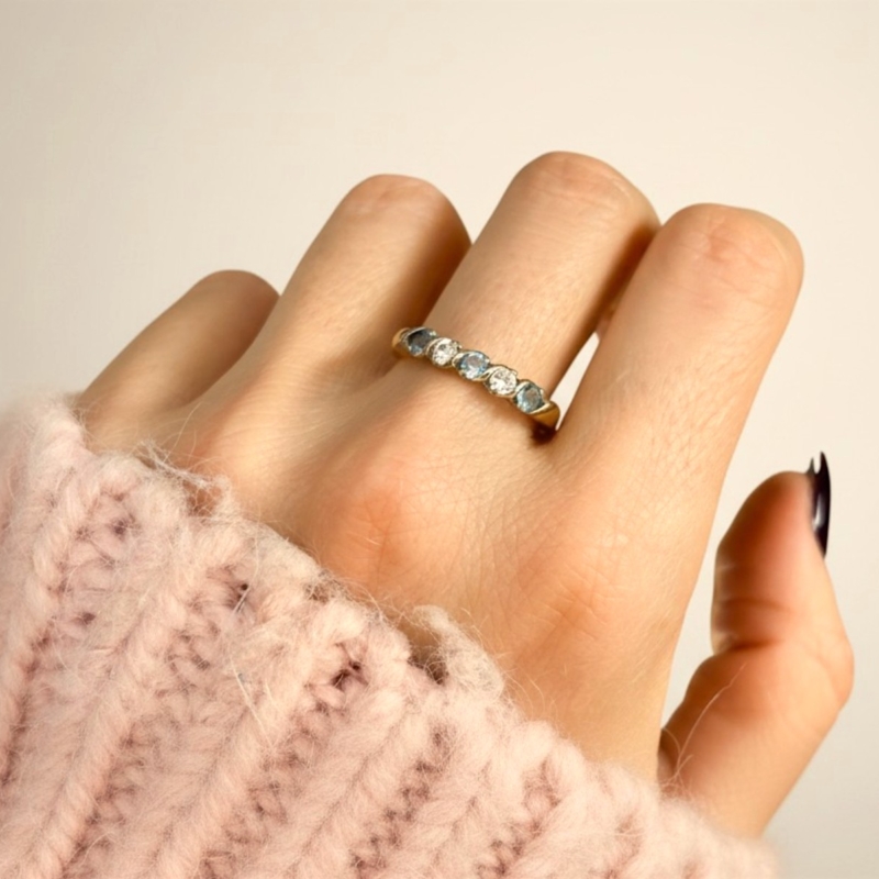 vintage 18ct gold blue topaz and diamond ring for sale in leeds, shown on a woman's hand