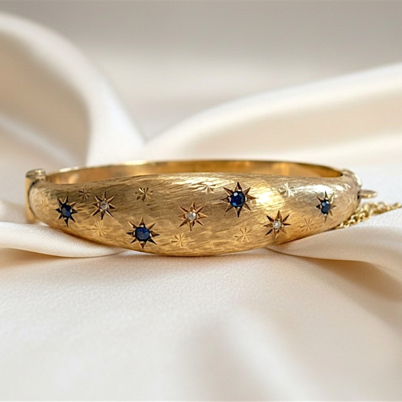 vintage sapphire and diamond bangle in 9ct gold circa 1960s for sale in Leeds, UK