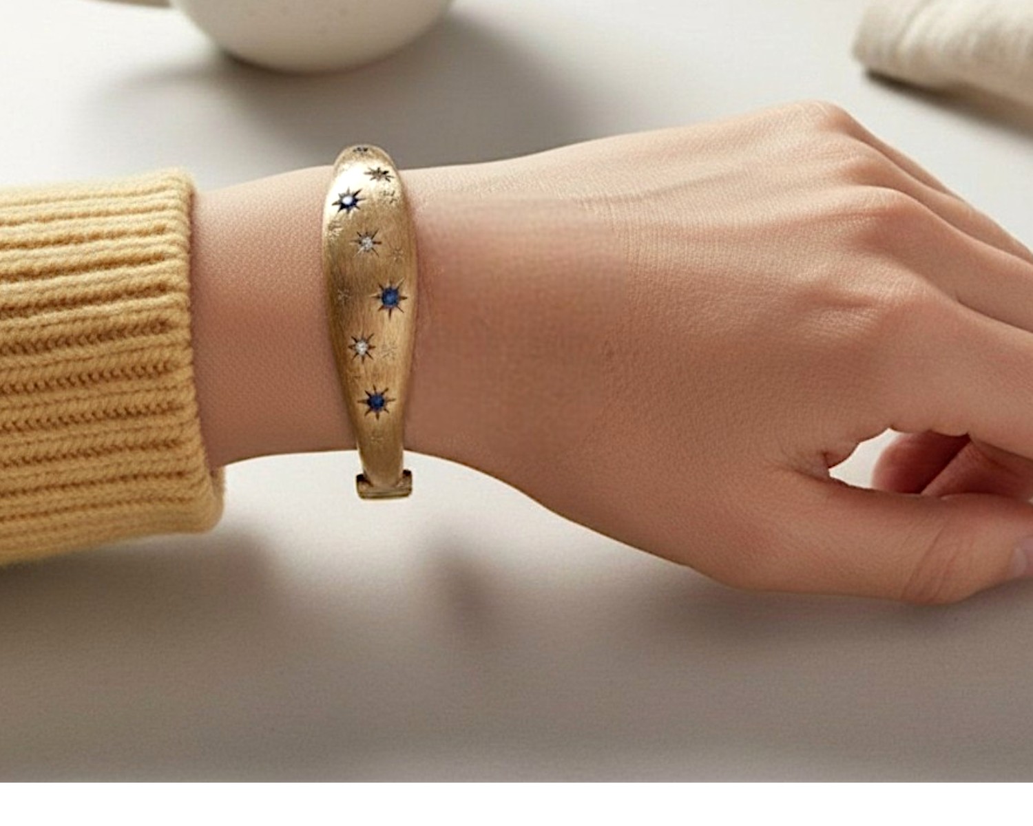 1960s sapphire bangle on hand