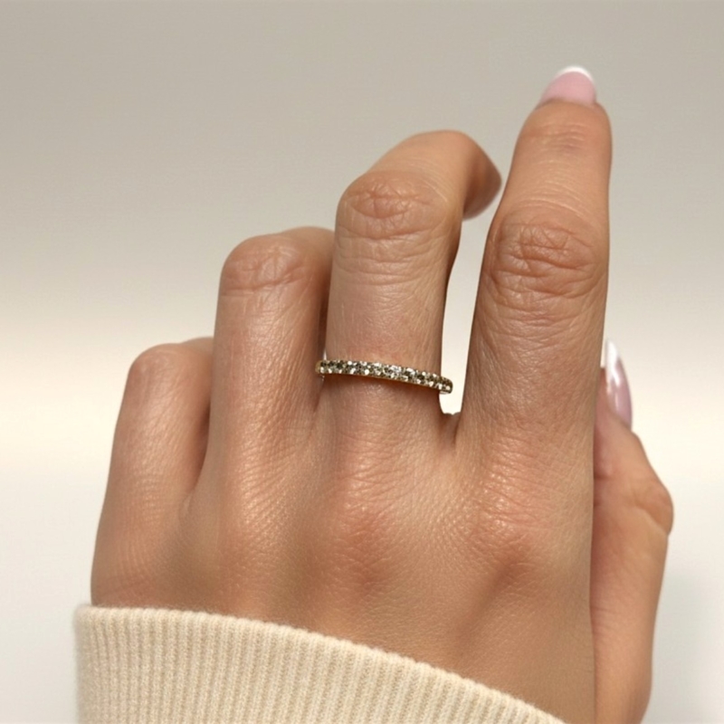 modern aquamarine ring in 9ct yellow gold for sale in Leeds, UK on model's hand