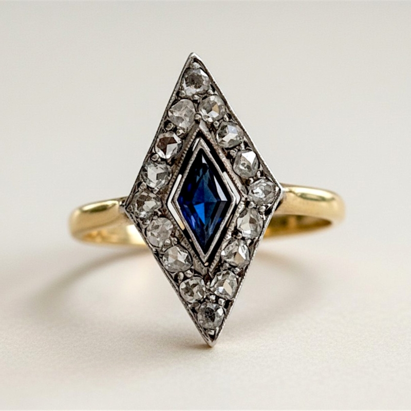 Art deco sapphire and diamond marquise cut ring in 18ct yellow gold and platinum for sale in Leeds