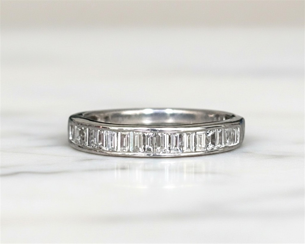 pre-owned baguette diamond half eternity ring in 18ct white gold for sale in Leeds