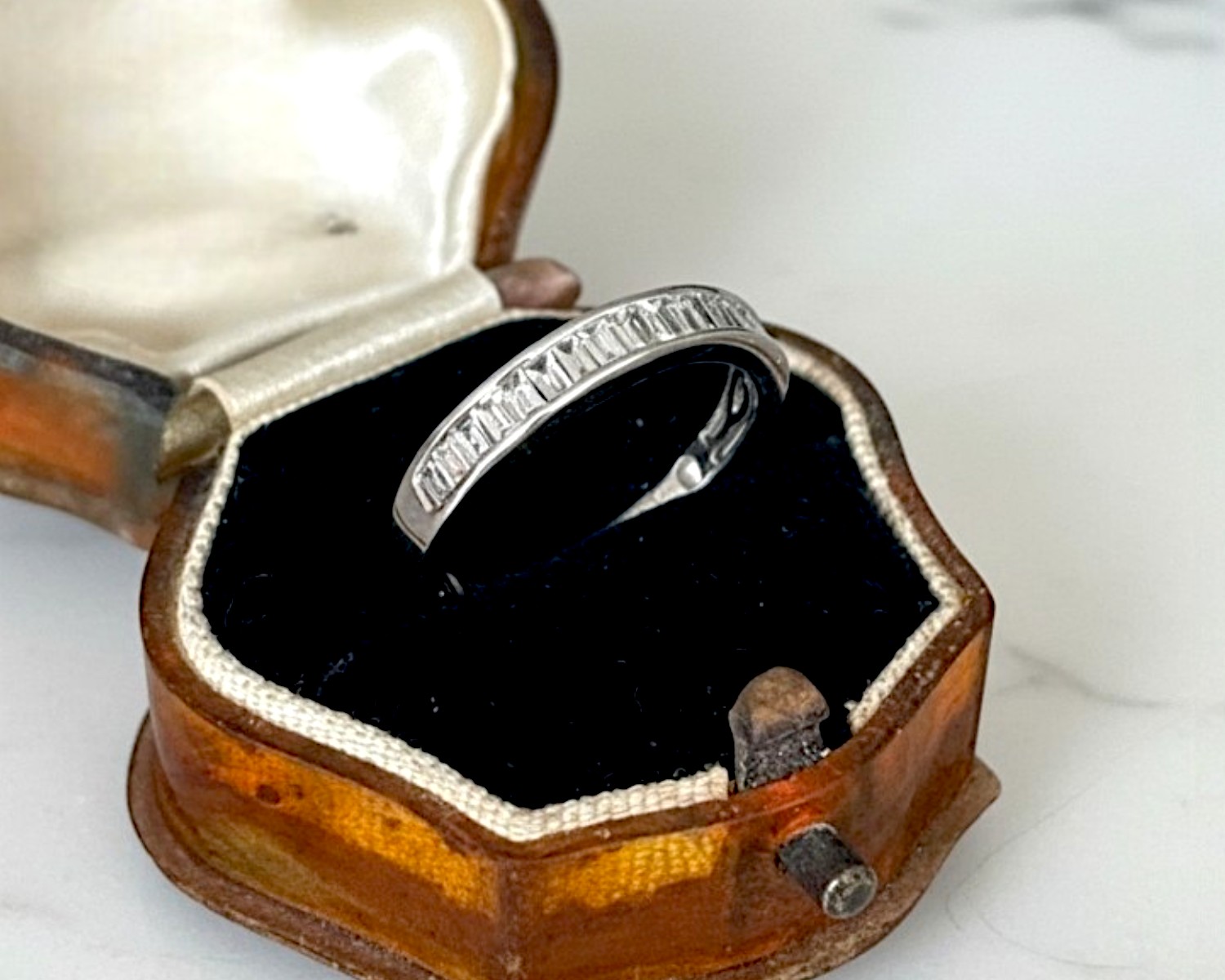 baguette half eternity ring in box