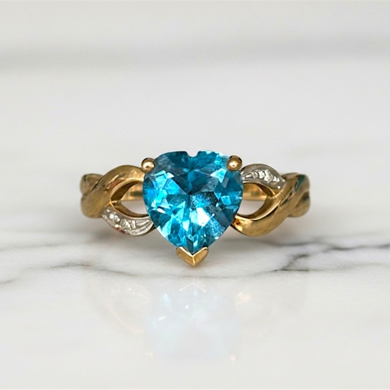 vintage blue topaz heart ring in 9ct gold with diamonds. For sale in Leeds, UK