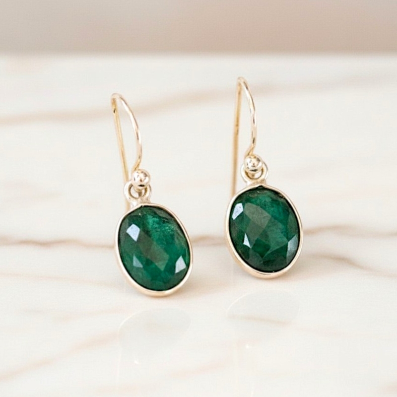 silver and emerald oval drop earrings with ear wire for sale in Leeds, UK