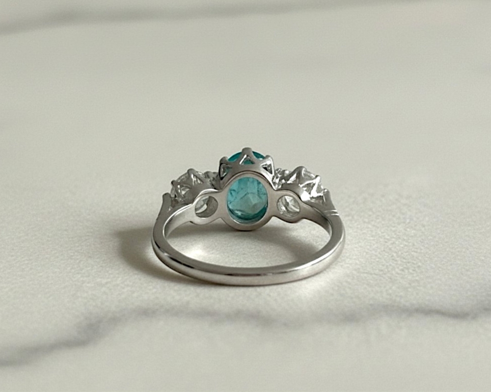 vintage style emerald and diamond three stone ring in platinum for sale in Leeds, UK, showing back of the ring