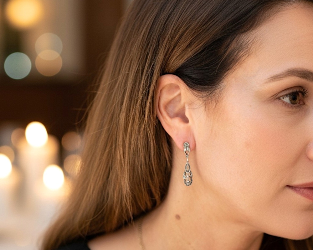 vintage style silver and marcasite drop earrings for pierced ears for sale in Leeds in model's ear