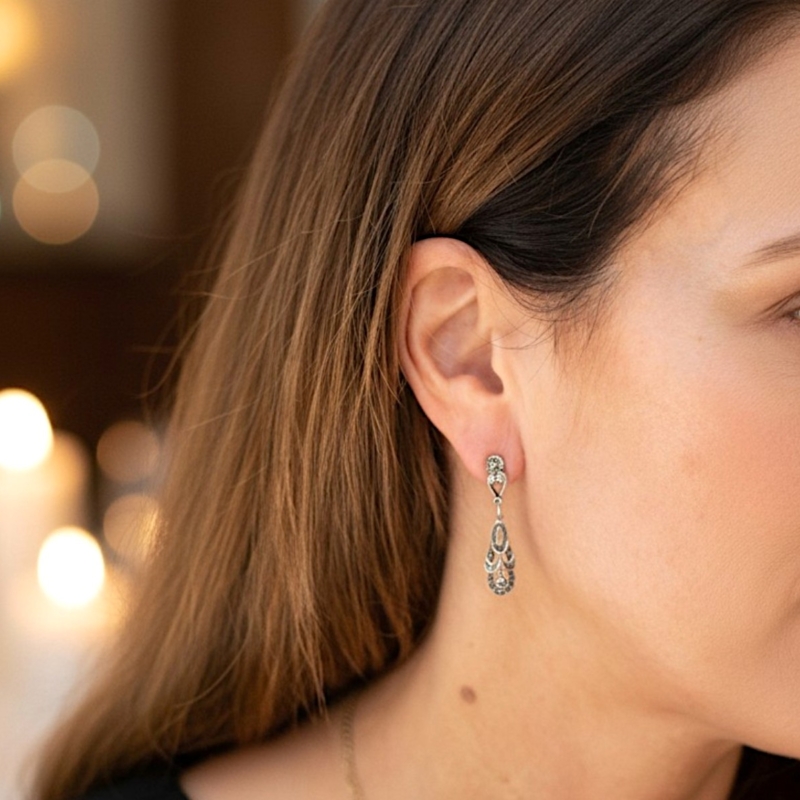 vintage style silver and marcasite drop earrings for pierced ears for sale in Leeds in model's ear