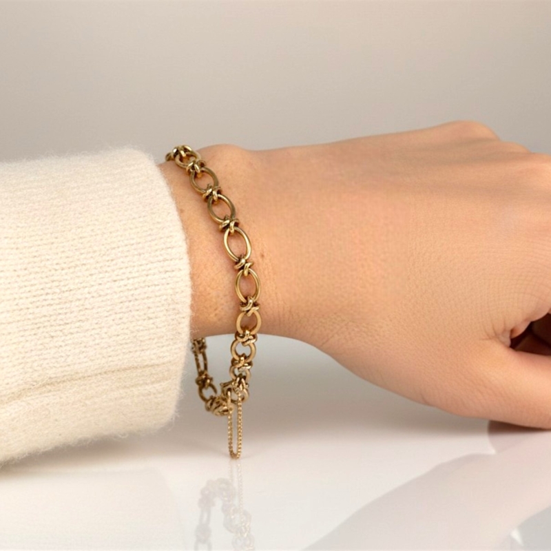 vintage 9ct gold oval link bracelet for sale in Leeds, UK, shown on woman's wrist