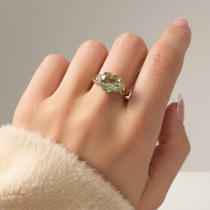 vintage green amethyst heart ring with diamond accents in 9ct yellow gold for sale in Leeds, UK on model's hand