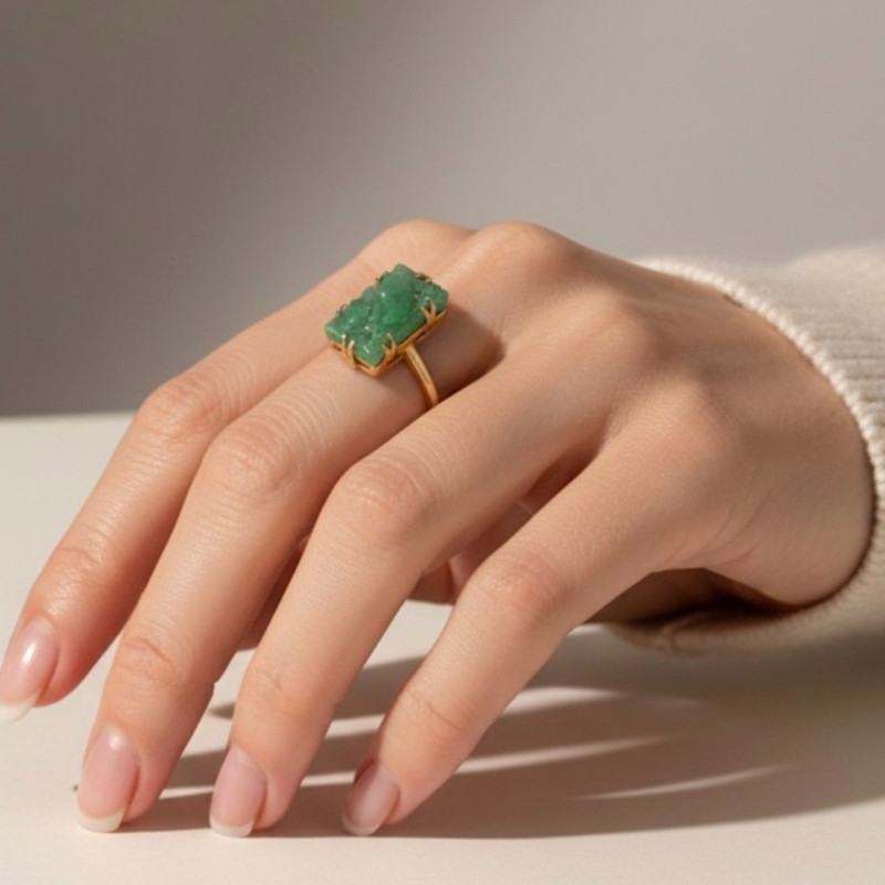 antique carved jadeite ring in 9ct gold for sale in Leeds, UK on model's hand