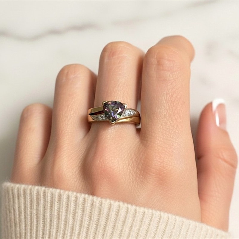 vintage mystic topaz ring in 9ct gold for sale in Leeds, on model's hand