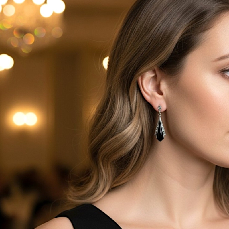 art deco style onyx earrings on a model's ear
