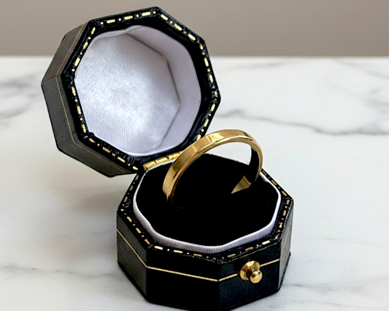 plain gold band in box