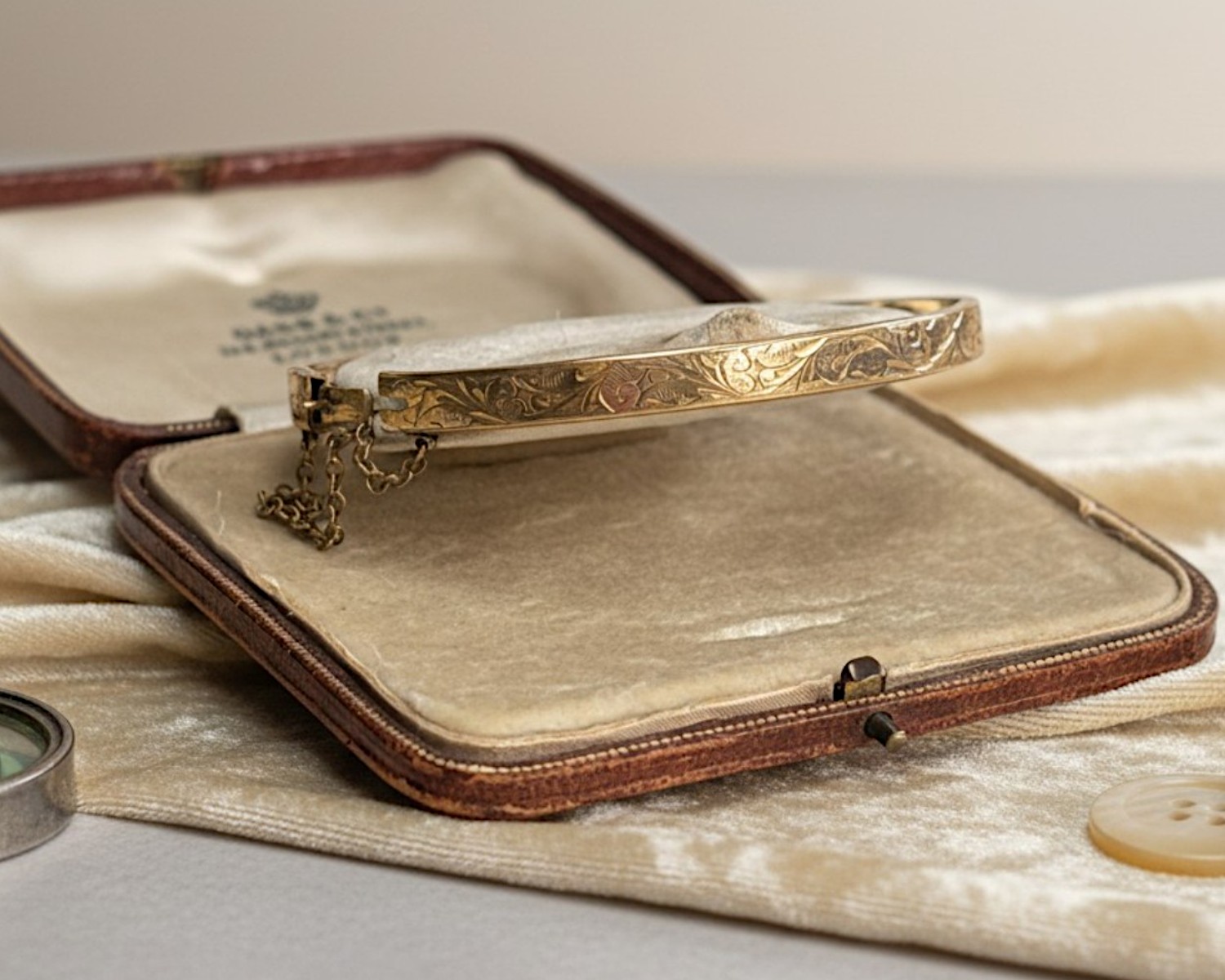 rolled gold bangle in box