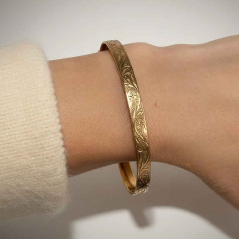 antique Edwardian rolled gold bangle on wrist